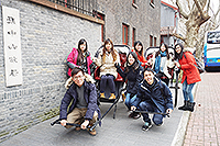 CUHK students have a taste of the life as uptown girls on rickshaws in front of the House of Sun Yat-sen (provided by participants of the winter programme organized by Fudan University)